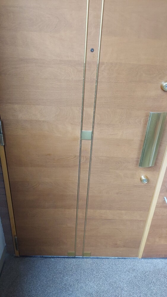 マンション玄関扉リペア前